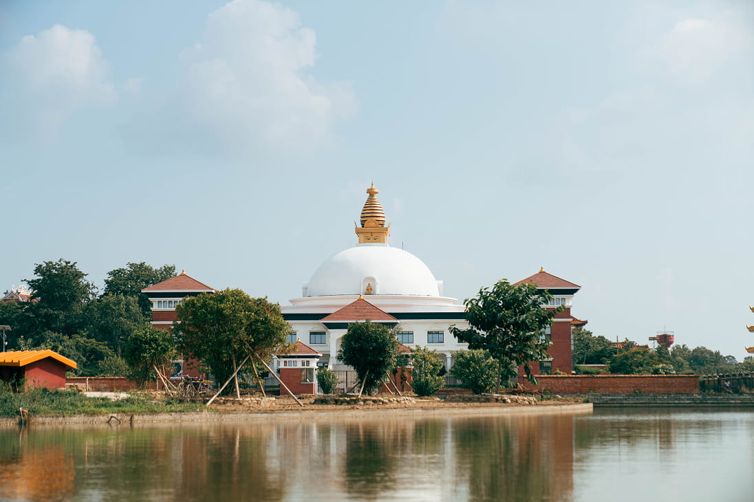 World Peace Pagoda reflected in the lake in Lumbini